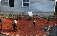 Mulched landscaping bed with path lights